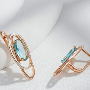 Rose White Gold Blue Topaz Oval Earrings